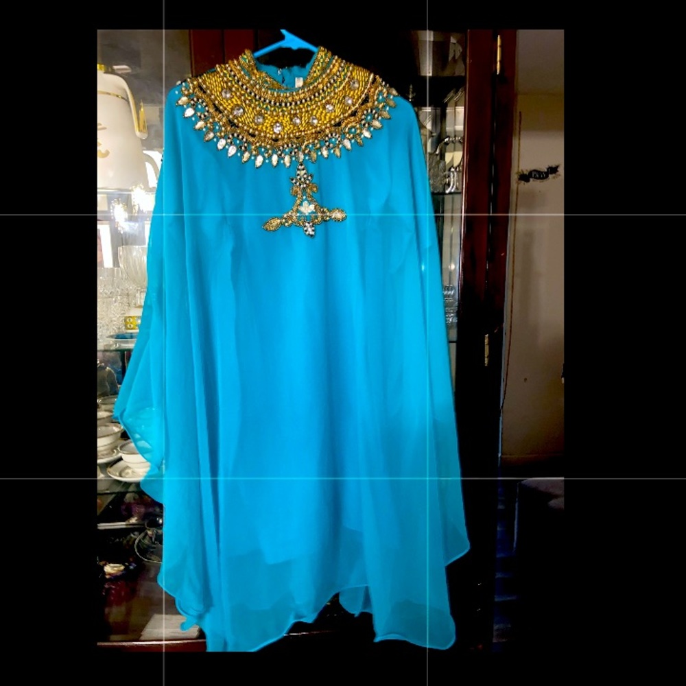 Size 38 ,cute blue Arabian abaya ,from girls from 8-9
